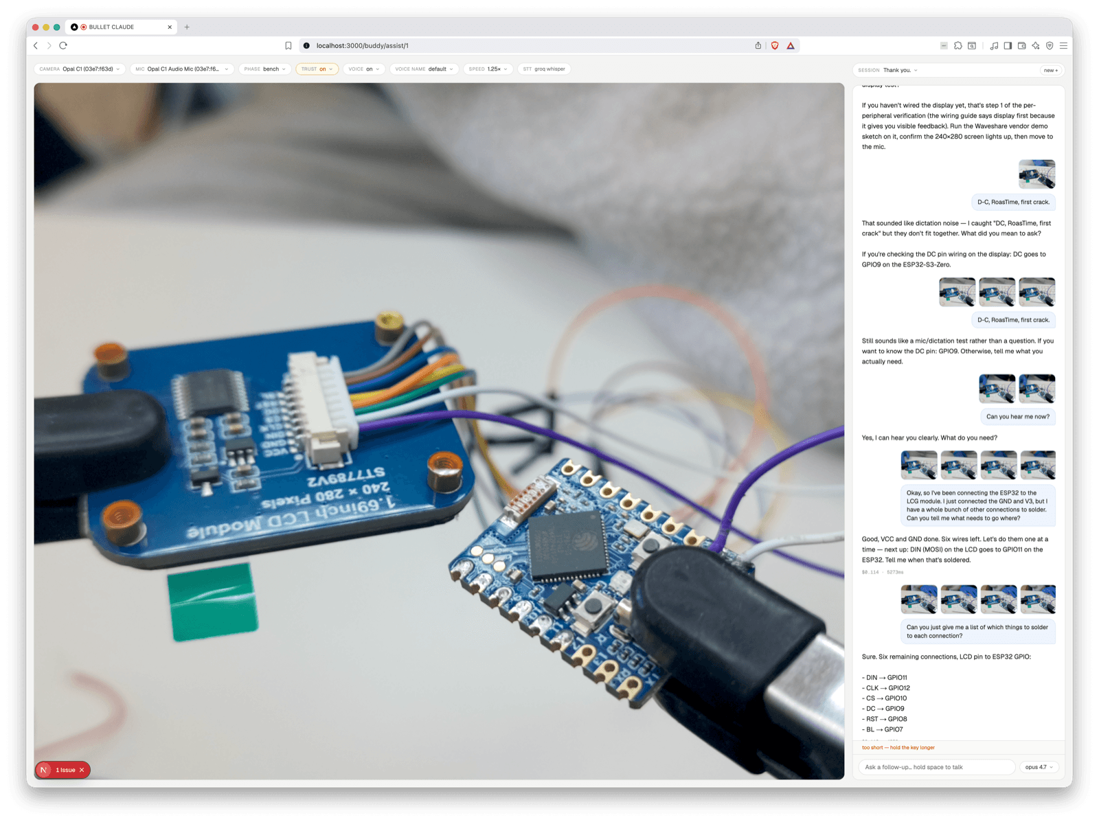 Screenshot of the build-assistant tool — a webcam view of the LCD module and ESP32 on a workbench, with a chat panel on the right showing AI-generated hardware guidance and code snippets.